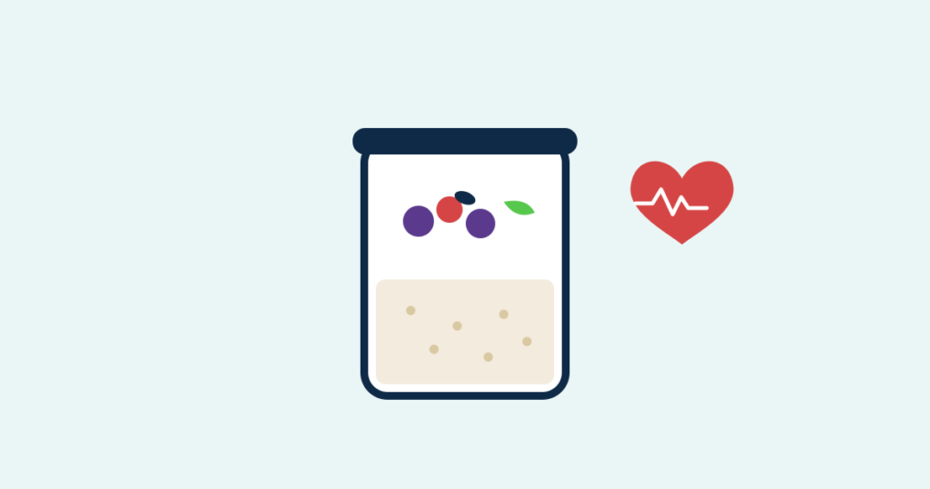 A jar of overnight oats topped with berries and seeds beside a heart with a pulse line